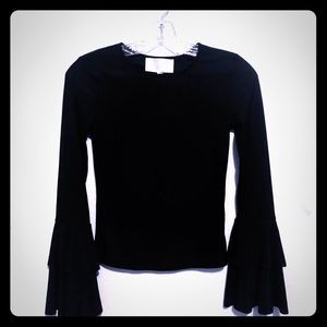 This is blouse by J.O.A.